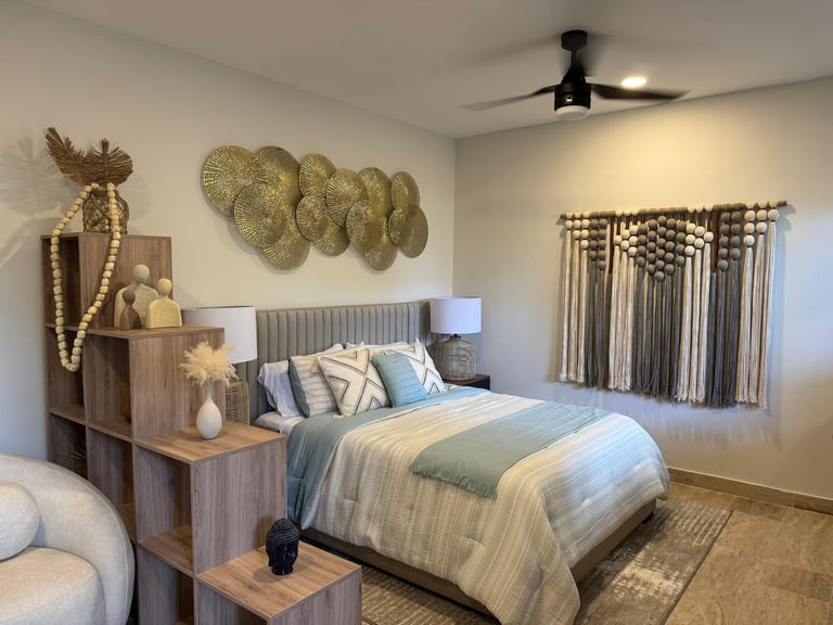 Modern bedroom with striped blue and white bedding, wooden shelving unit headboard, woven plate wall art, and macramé curtains