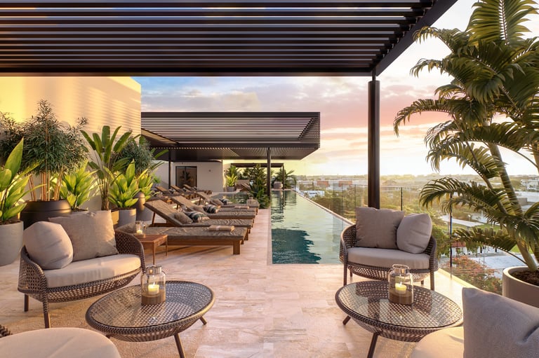 Modern rooftop terrace with comfortable seating, lounge chairs, tropical plants, and panoramic city views at sunset