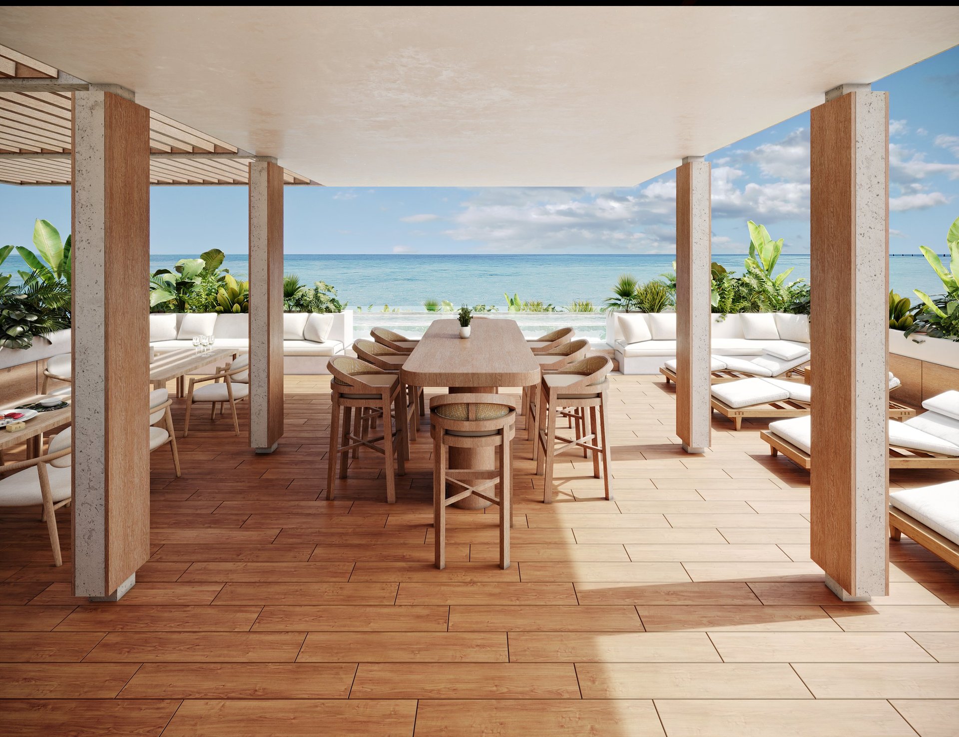 Luxury beach pavilion with wooden dining table, chairs, lounge beds, and ocean views under a pergola with shade sails